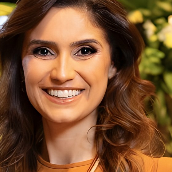Retrato da nutricionista Andréa Coradine sorrindo